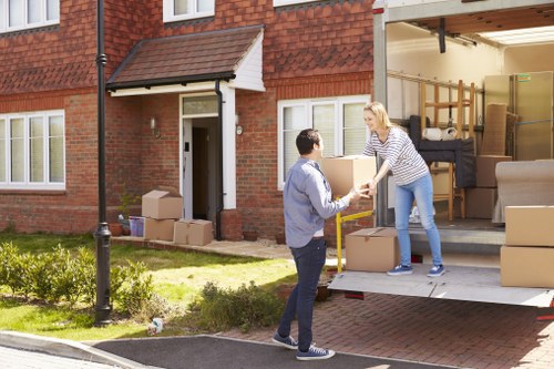 Professional local removals team loading boxes in Edgware