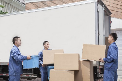 Local packing team in Edgware arranging boxes for transport
