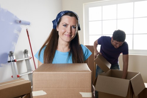 Furniture and moving cartons representing load-based storage rates in Edgware