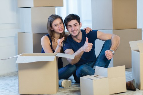 House removal team handling furniture in Edgware